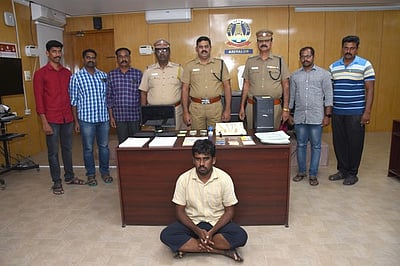 காப்பீடு செய்வதாகக் கூறி பண மோசடி செய்த கா்நாடகா நபா் கைது