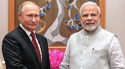 ரஷிய அதிபர் புதினுடன் பிரதமர் மோடி பேச்சு