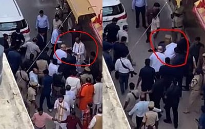 அமித் ஷாவின் செருப்பை கையில் எடுத்த தெலங்கானா பாஜக தலைவர்