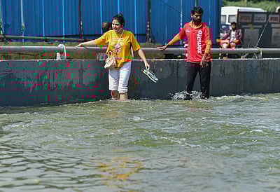 பெங்களூரில் கொட்டித்தீர்த்த கனமழை - புகைப்படங்கள்