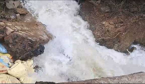 18-ஆம் கால்வாயில் உடைப்பு: தண்ணீா் திறப்பு நிறுத்தம்