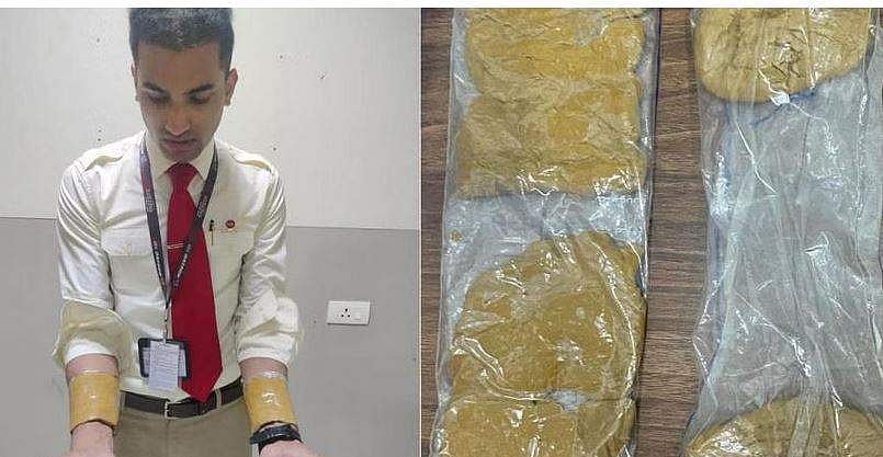 1487 கிராம் தங்கத்தை கையில் கடத்தி வந்த ஏர் இந்தியா ஊழியர் கைது