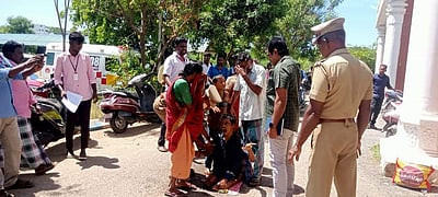 மாற்றுத்திறனாளி மகனுடன் தொழிலாளி தீக்குளிக்க முயற்சி!