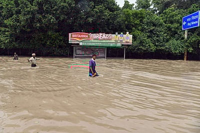 வடமாநிலங்களில் வெளுத்து வாங்கும் கனமழை - புகைப்படங்கள்