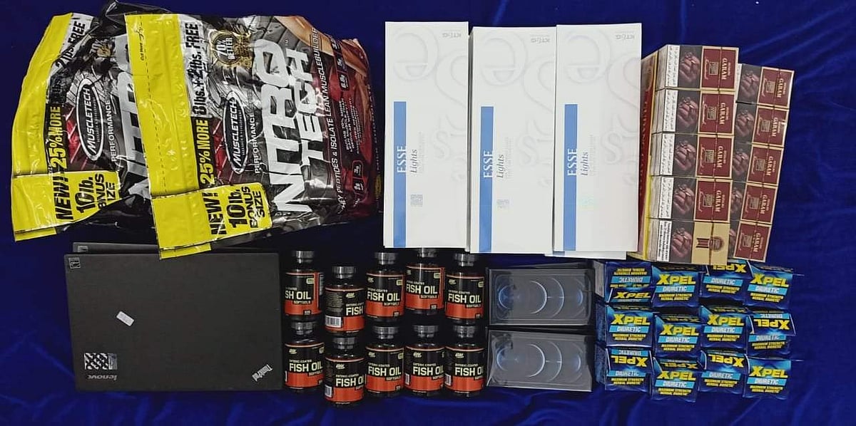 பறிமுதல் செய்யப்பட்ட மருந்துகள் மற்றும் சிகரெட்டுகள்